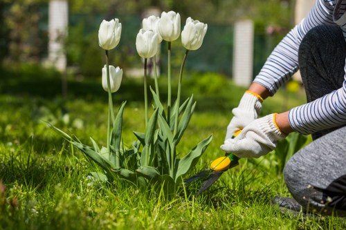 Gardening team preparing tools at the start of a job