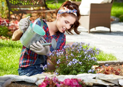 Gardener inspecting a residential garden